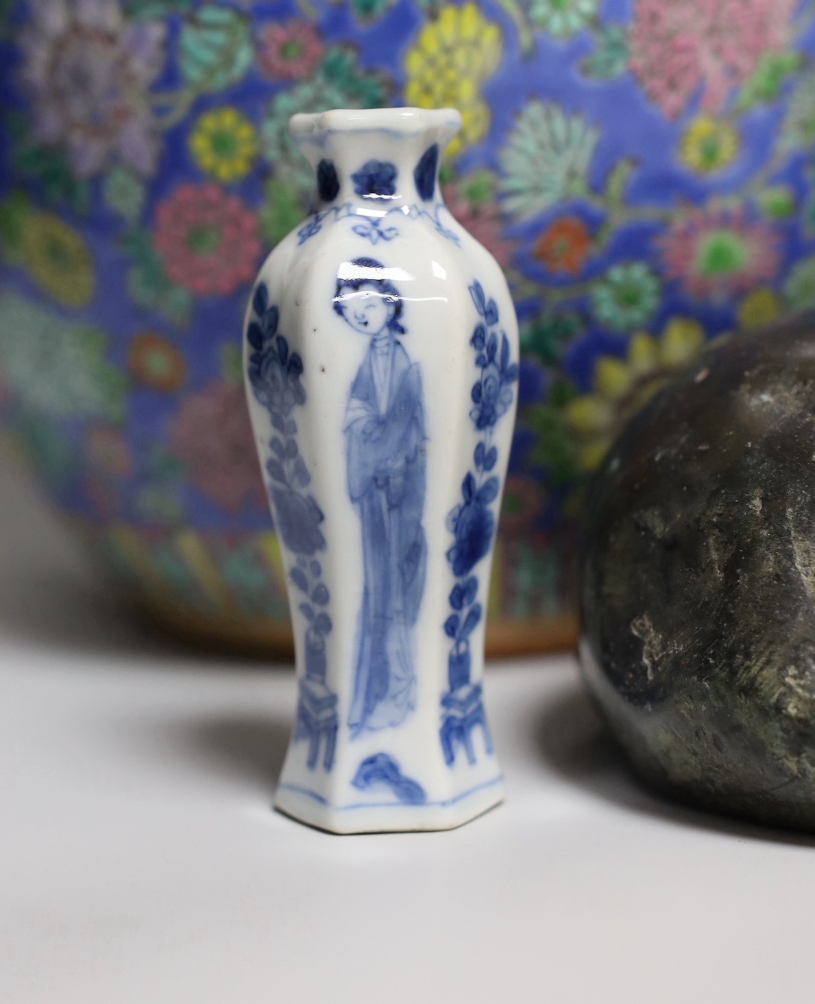 A Chinese Kangxi blue and white miniature vase, 9cm tall, a 19th century Chinese wood writing box, a famille rose jardiniere, blue and white jar and cover etc.